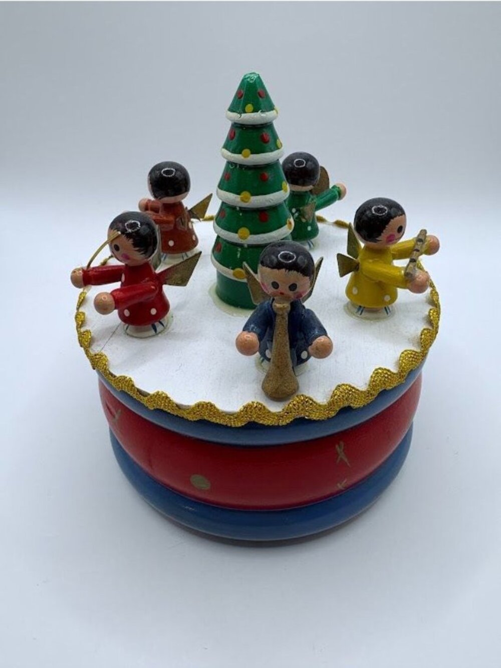 Vintage Erzgebirge-style German wooden music box features revolving angels